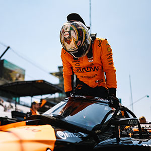 Pato O'Ward gets into his car to practice